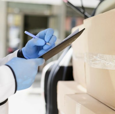 close-up-individual-checking-delivery-list v2